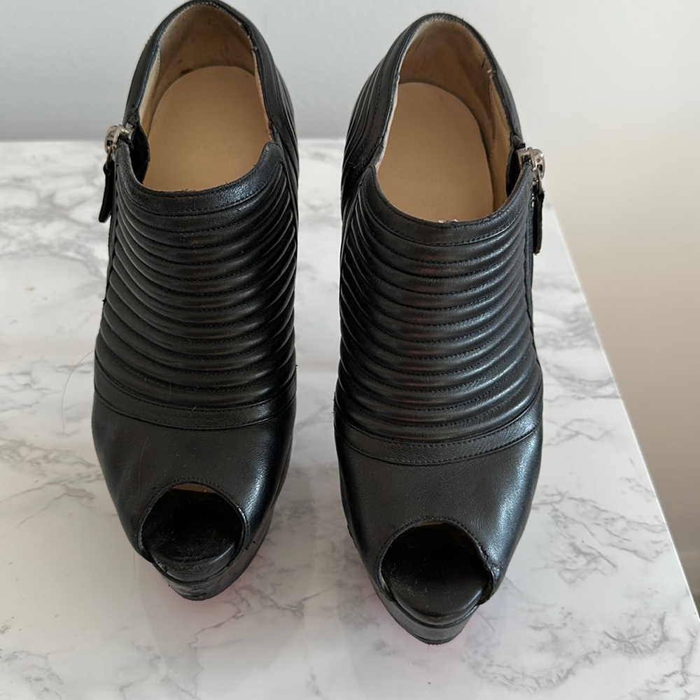 Black louboutin heels